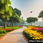 도시재생에서의 생물 다양성 증진 방안 - A vibrant urban park scene in a Bengali city during early morning light, featuring diverse species o...